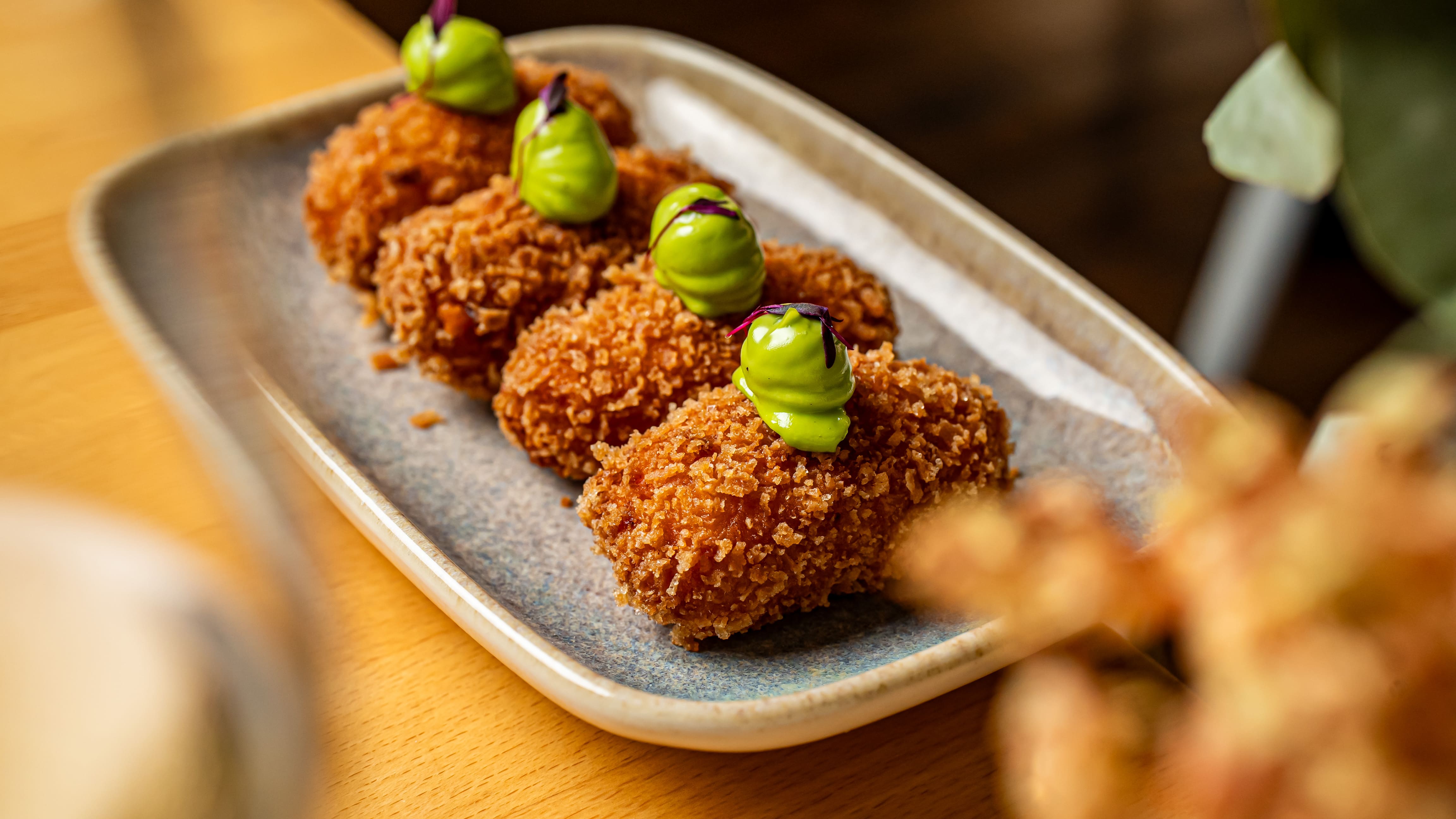 Sun-dried tomato and basil croquettes at Més de Vi